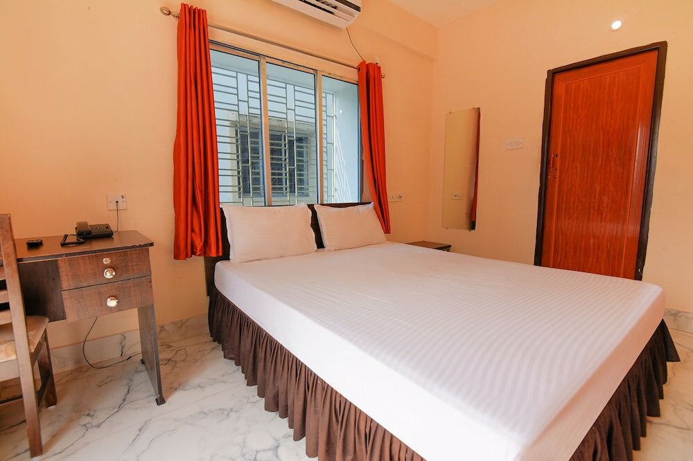 Фото Fabhotel Ashraya Inn