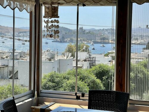 Апартаменты House Close to Beach With a Sea View in Bodrum в Бодруме