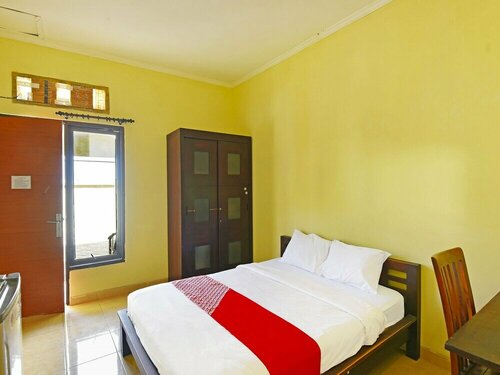 Гостиница Oyo 91485 Agung Parigata Residence в Джимбаране