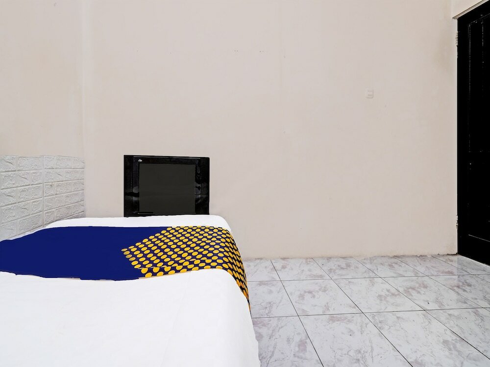 Фото Spot On 91589 Bunda Homestay Syariah