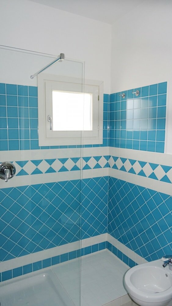 Фото Affittimoderni Isola Rossa Élite - Pati19