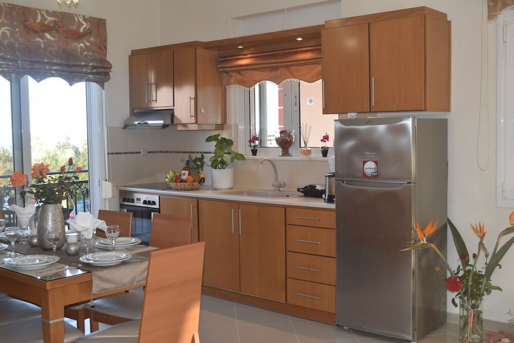 Фото Zoi's Holidays Apartment