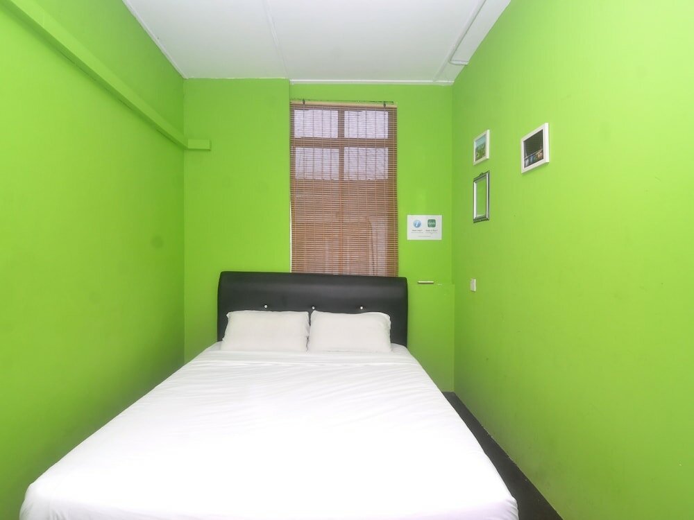 Фото Spot On 89929 Tropical Lodge