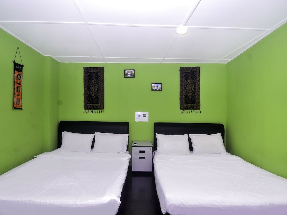 Фото Spot On 89929 Tropical Lodge