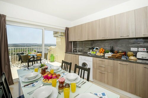 Гостиница Summer Breeze Superior Apartment with Terrace by Getaways Malta