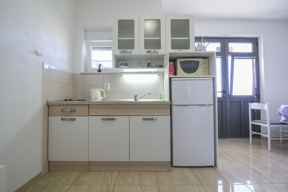 Фото La Storia Apartments