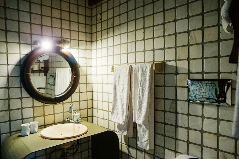 Фото Oikoperiigitis Hotel