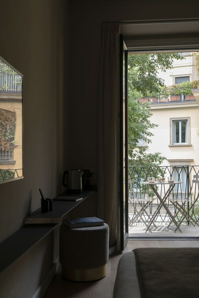 Фото Della Spiga Suites by Brera Apartments