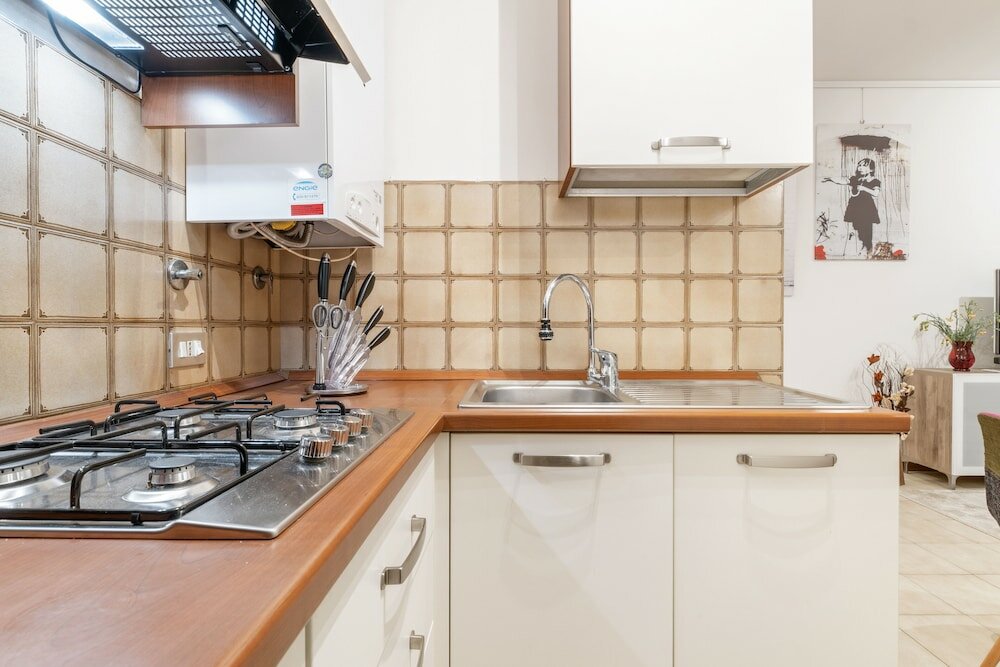 Фото Sognando tra i tetti bolognesi Apartment