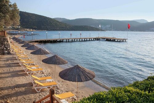 Гостиница DoubleTree by Hilton Bodrum Isil Club All-Inclusive Resort в Бодруме