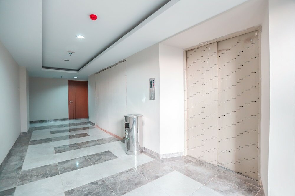 Фото Oyo 498 Green Lake View Ciputat Syariah