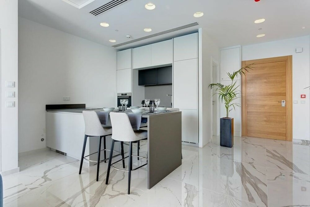 Фото Stunning Apt Sea Views in Tigne Point, With Pool