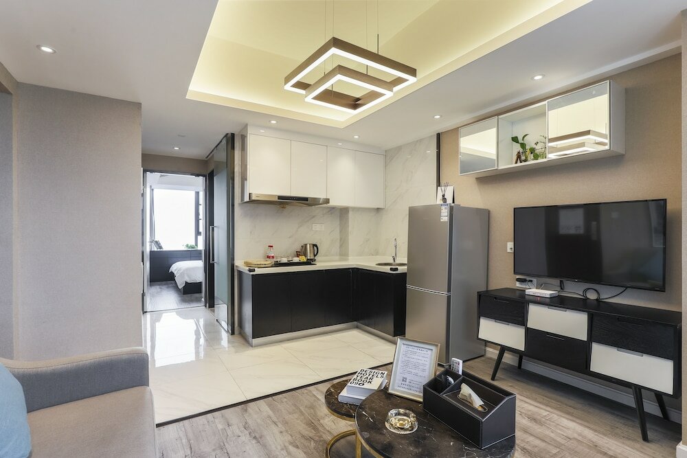 Фото Yue Qi Hotel Apartment