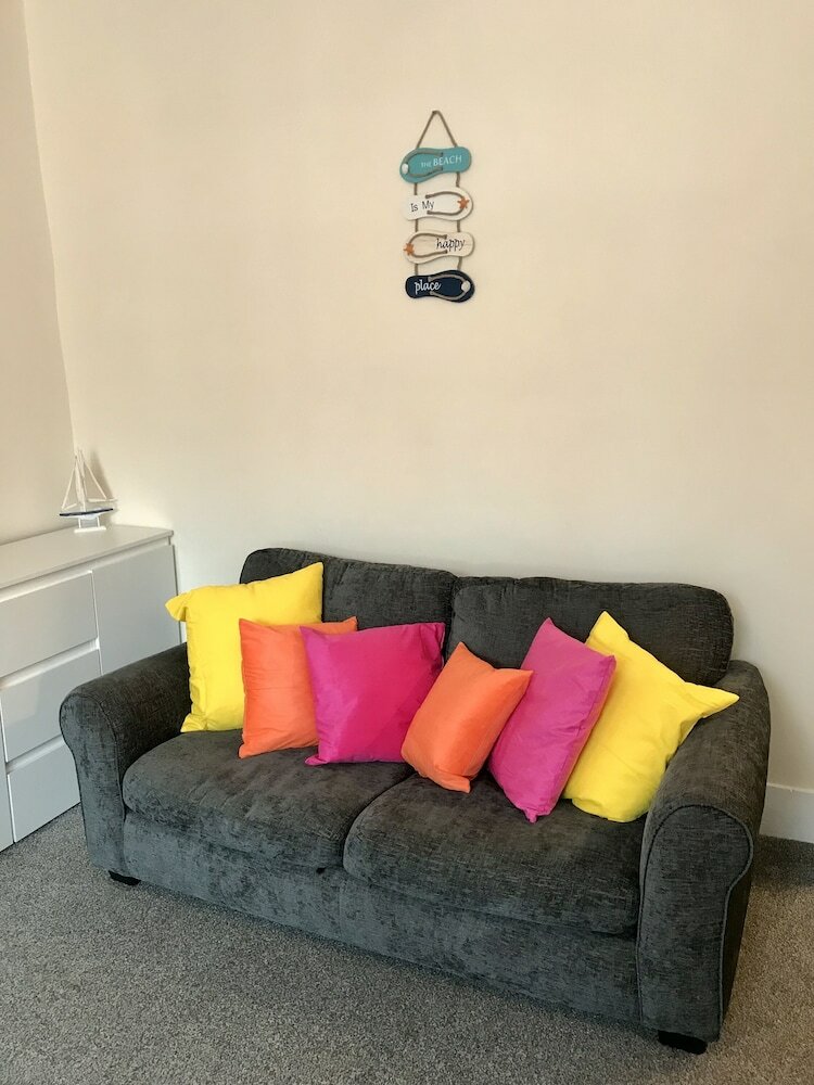 Фото Coastal Apartment