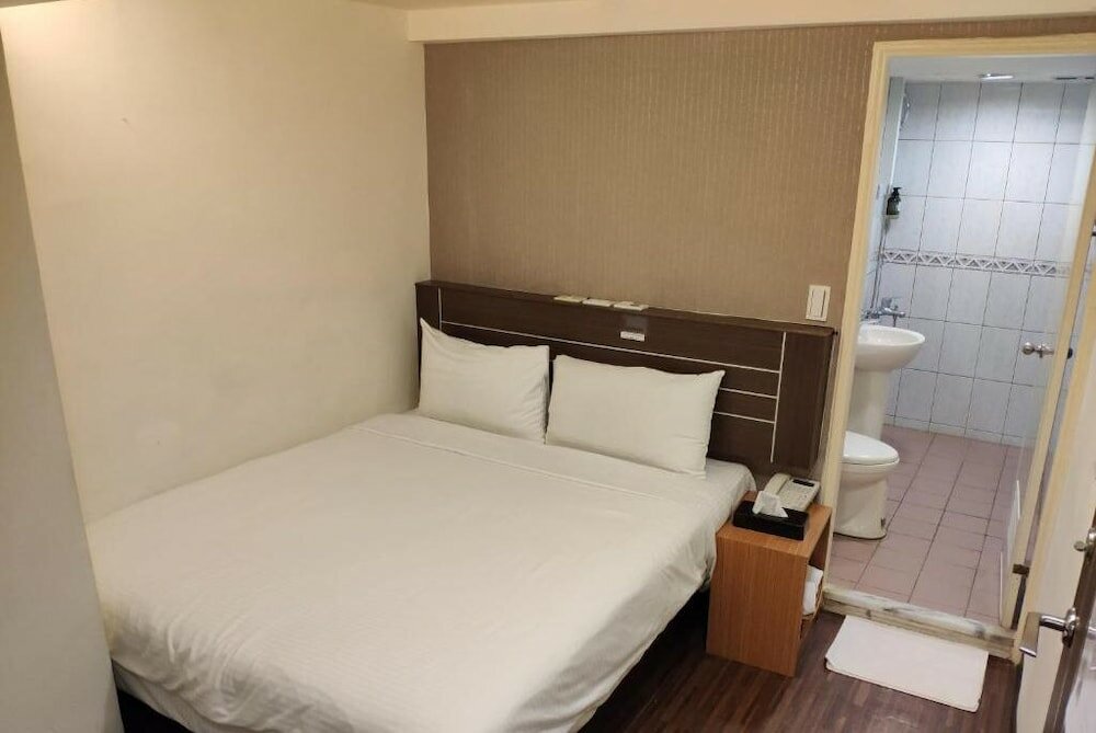 Фото Jhong-Sing Hotel