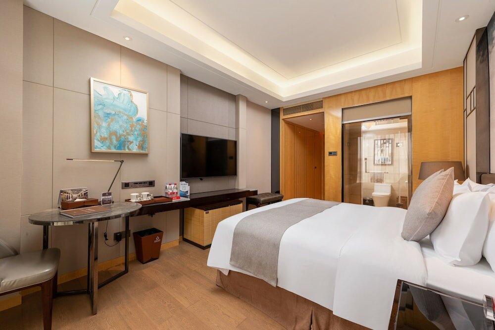 Фото Zhuhai LongZhuDa International Hotel