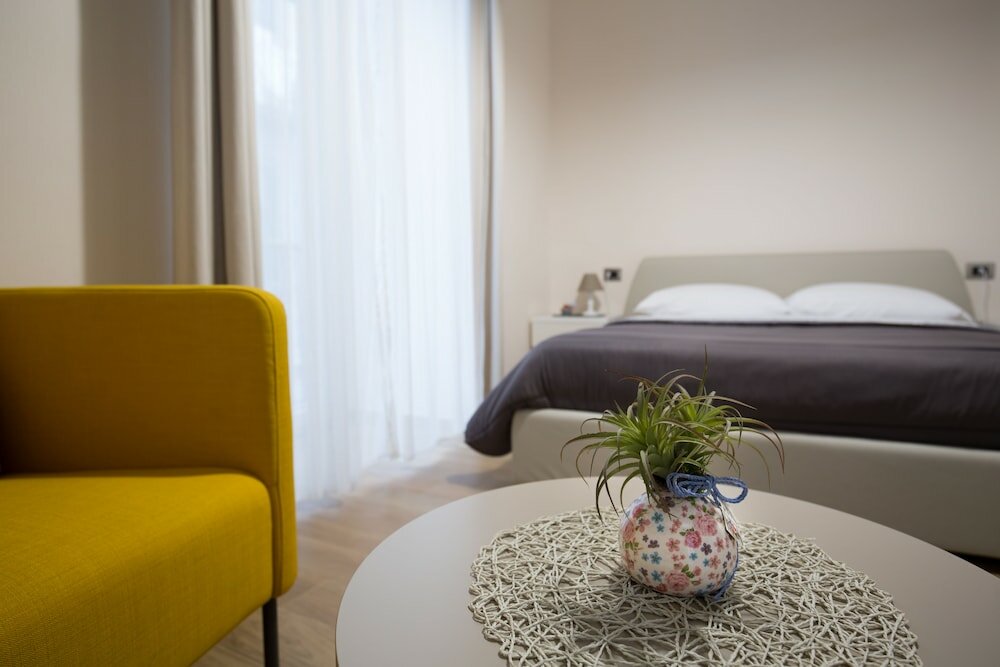 Фото Musto Suites & Rooms