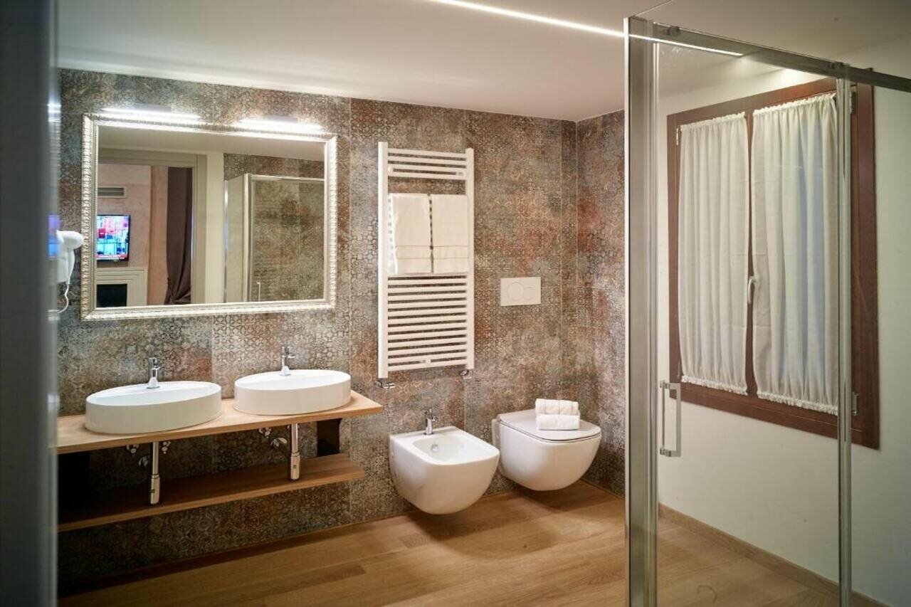 Фото Ca' dei Proverbi Suites