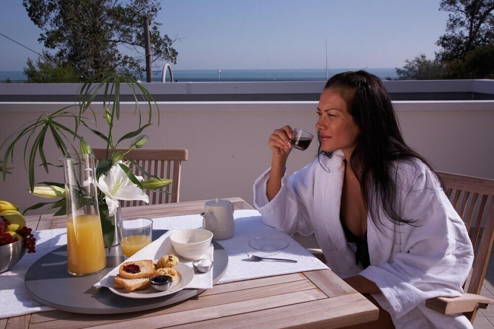 Фото Noha Suite Hotel