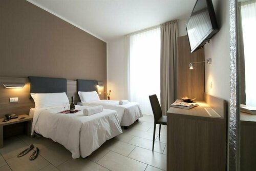 Гостиница Oasi Village Hotel в Милане