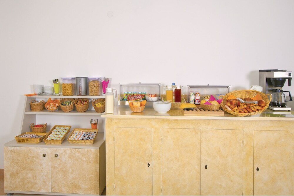 Фото Séjours and Affaires Lyon Saint Nicolas