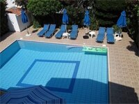 Фото Rododafni Beach Apartments