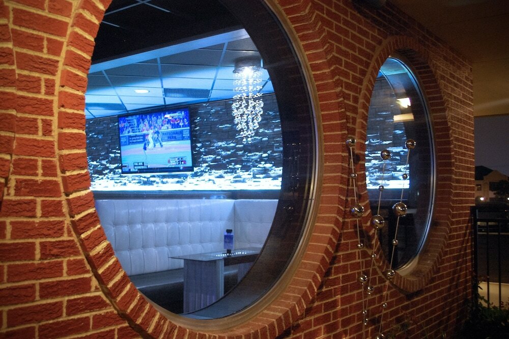 Фото Unique Suites Hotel