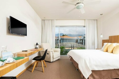 Гостиница Hotel Villa Los Candiles в Санта-Ане