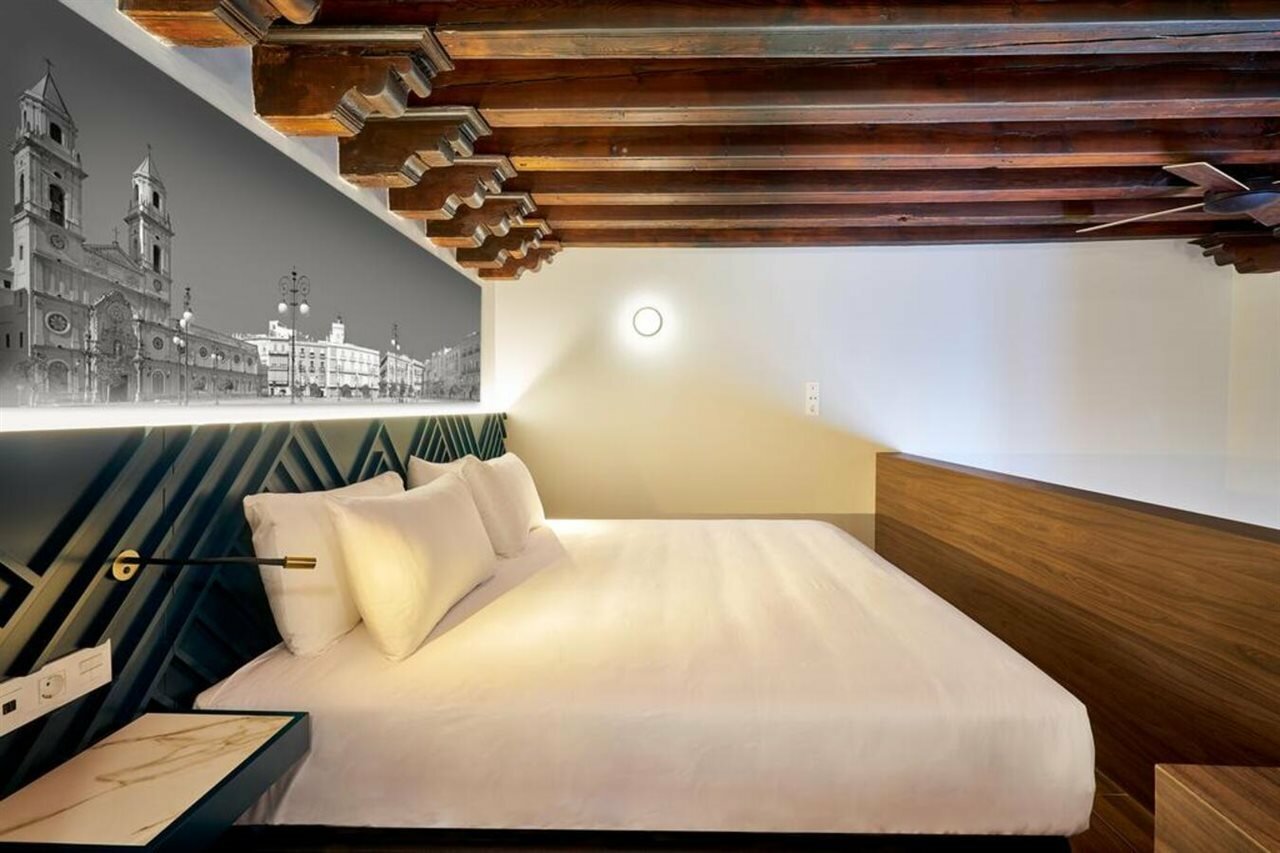 Фото Tandem Torres De Cádiz Suites