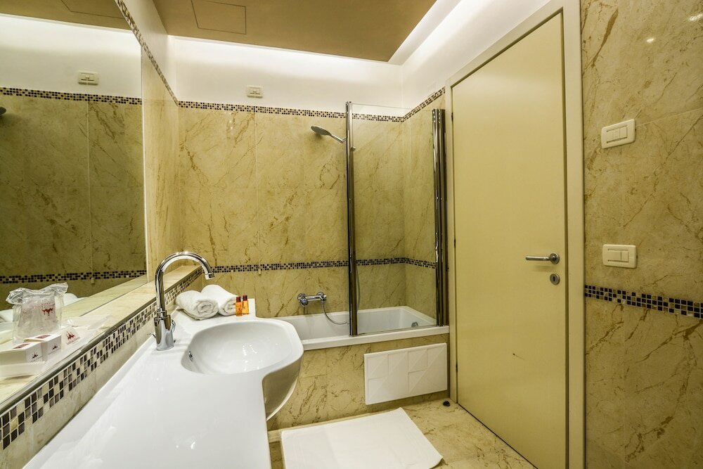 Фото Torre dell'Orologio Suites