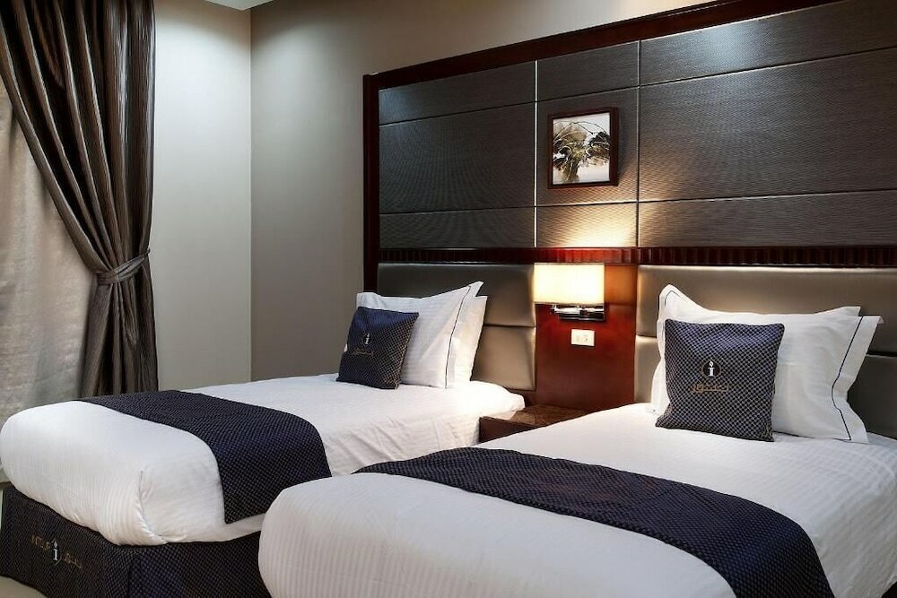 Фото Intour Qurtoba Hotel Suites