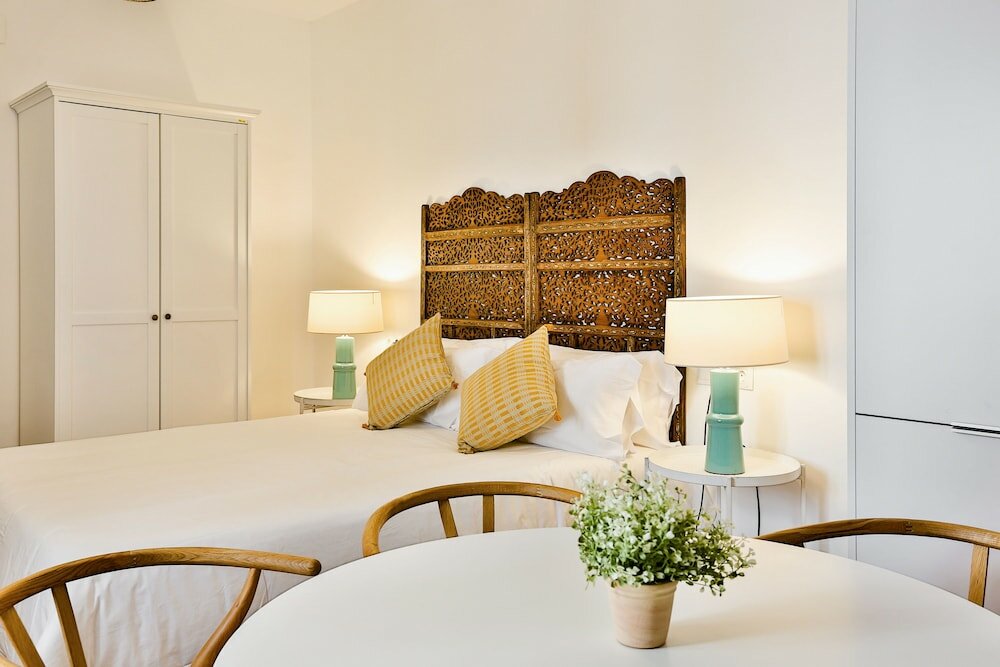 Фото Apartamentos Puerta Sevilla De Cordoba