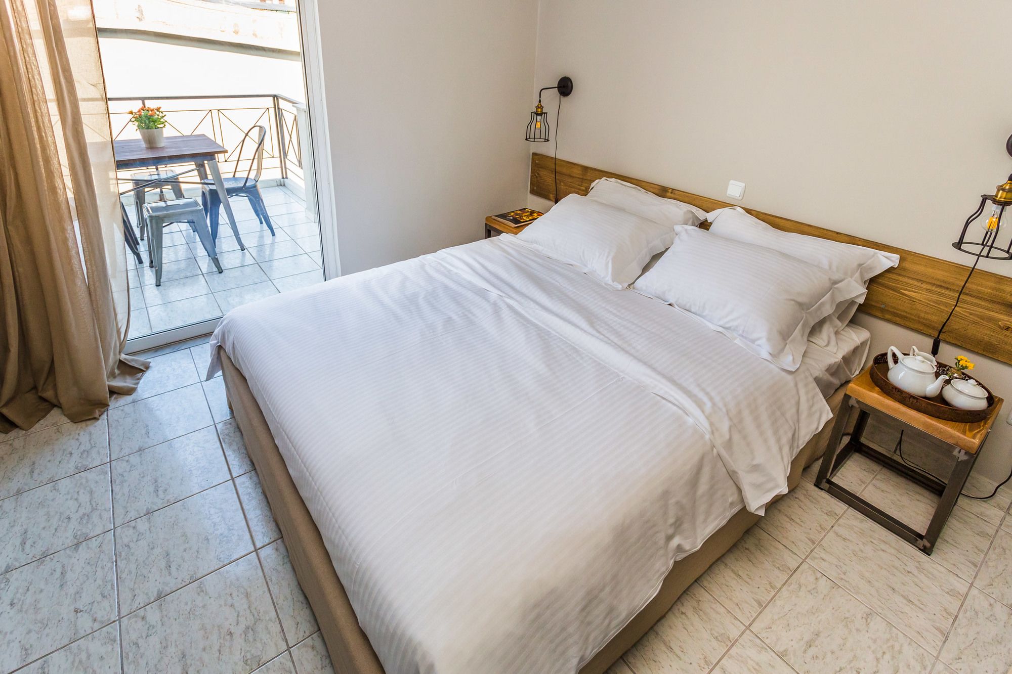 Фото Aris Athens Suites