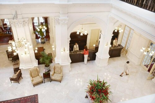 Гостиница Raffles Singapore в Сингапуре
