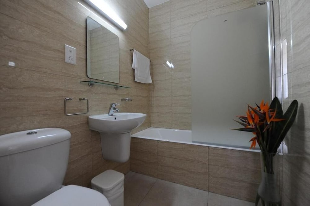 Фото Cosmelenia Hotel Apartments