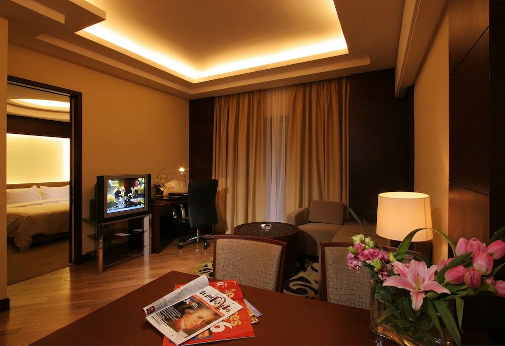 Фото Ningbo Portman Plaza Hotel