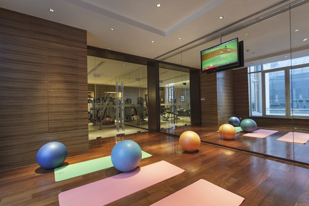 Фото Somerset Grand Central Dalian