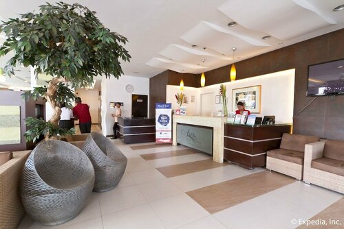 Внешний вид отеля Alpa City Suites в Мандауэ, фото 2
