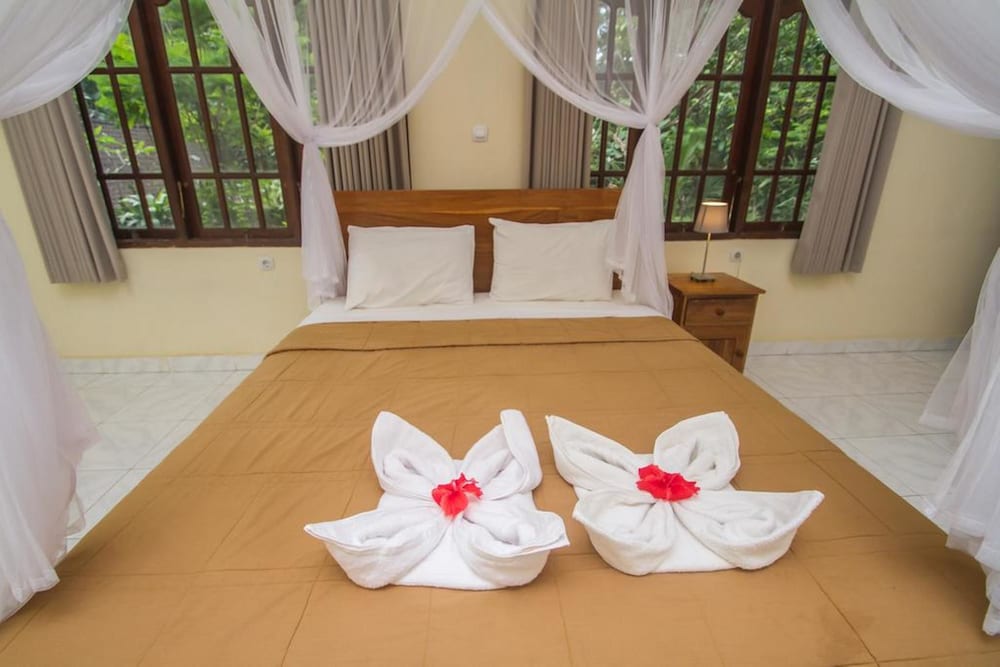 Фото Omah D'Taman Hotel by Eps