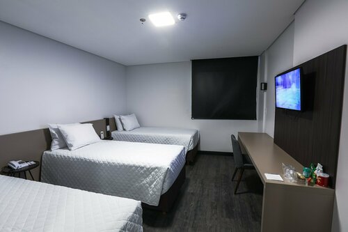 Гостиница Travel Inn Axten Caxias do Sul  