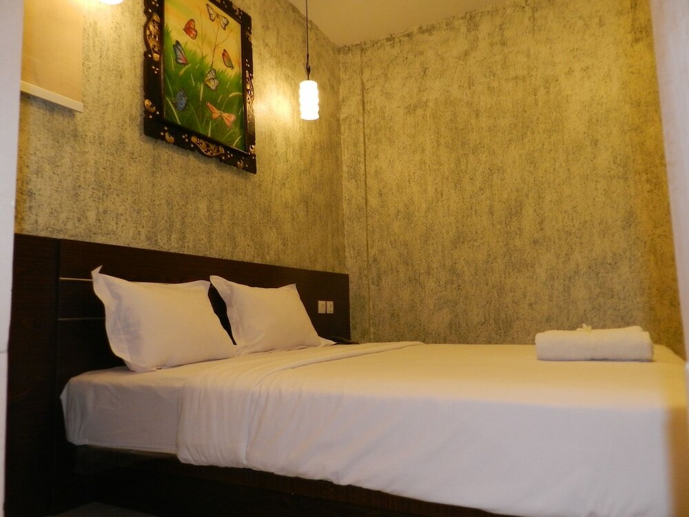 Фото S8 Suardana Hotel