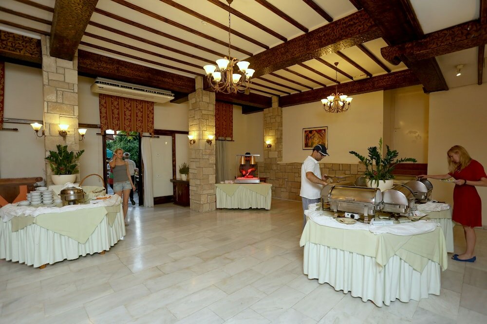 Фото Dionysos Central Hotel