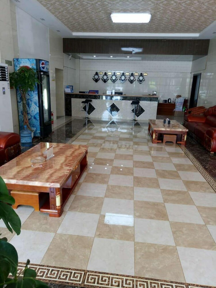 Фото Huayun Business Hotel