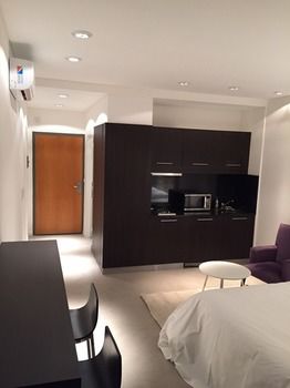 Фото Checkin Apartments