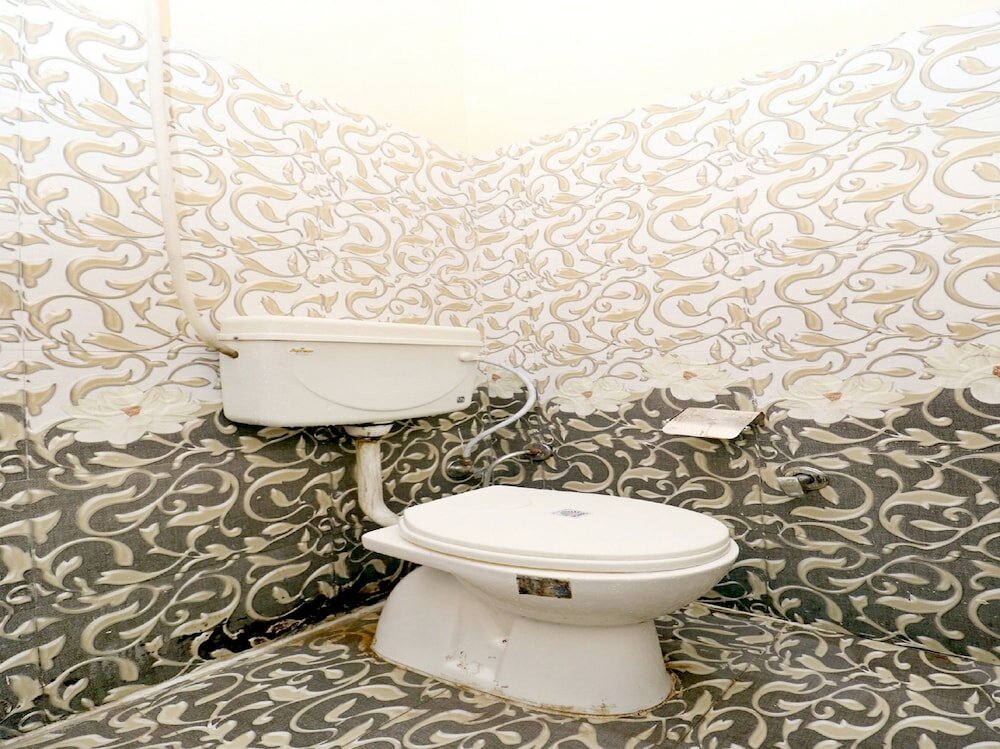 Фото Oyo 39626 Rj Royal Guest House