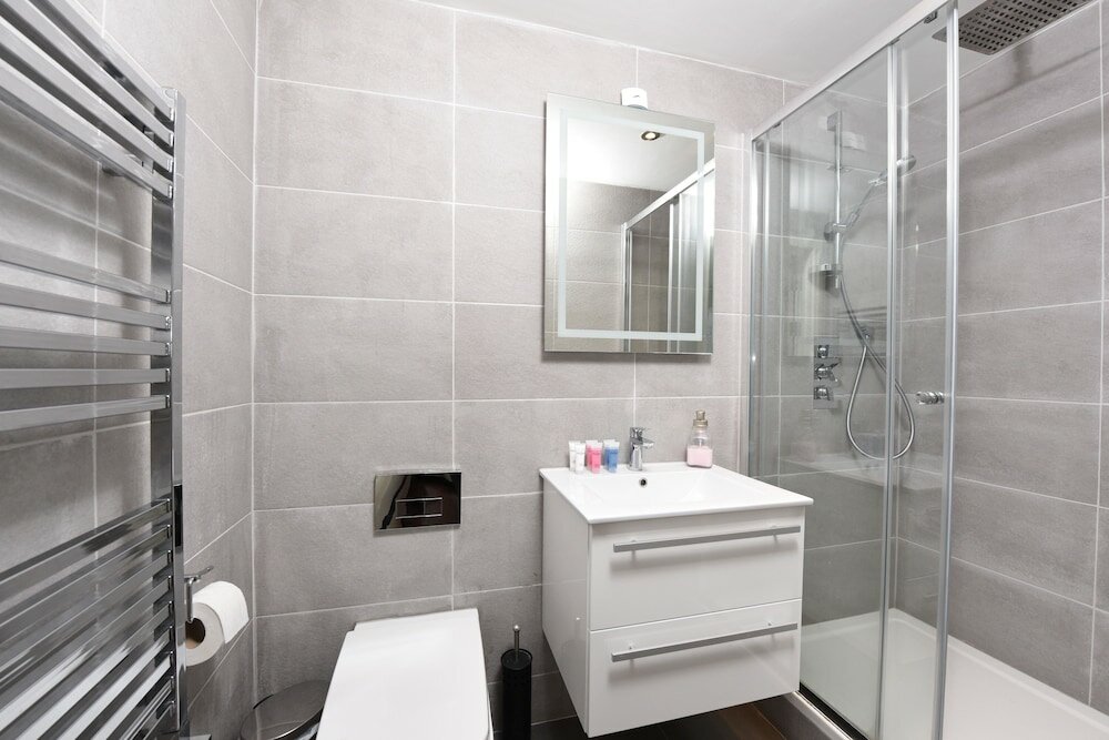 Фото The Glasshouse Apartments