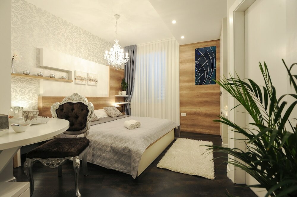 Фото Silver & Gold Luxury Rooms