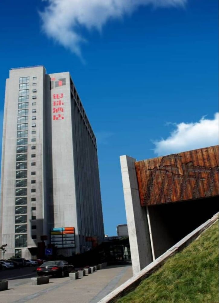 Фото Tianjin In-Zone Hotel