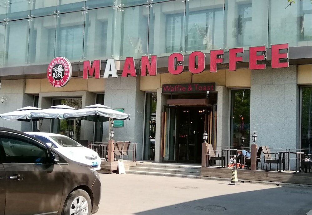 Фото Tianjin In-Zone Hotel