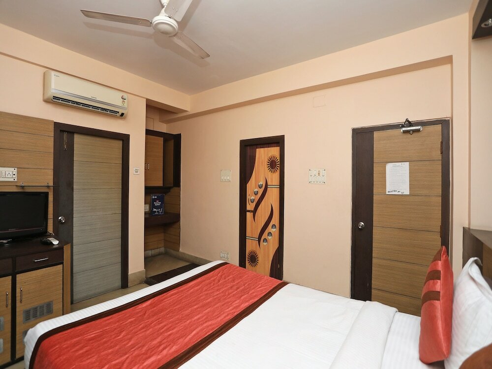 Фото Oyo 6606 Seacom Inn Purbadiganta